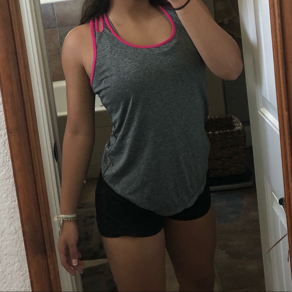 2 tanks tops and 1 shirt from various brands
